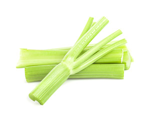 Fresh celery stalks on a white background