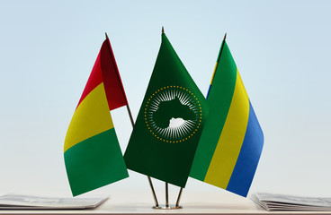 Flags of Guinea African Union and Gabon