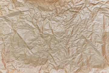 Texture of wrinkled, crumpled craft paper.