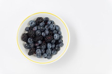 Blueberries and Blackberries in a bowl Top View