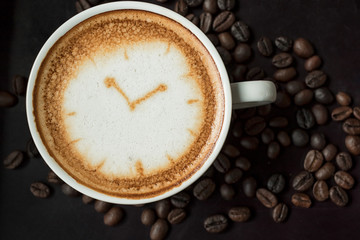 Coffee time ,Cup of fresh cappuccino with clock sign.