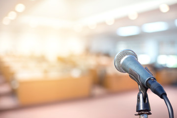 Microphone in conference on seminar room event background	