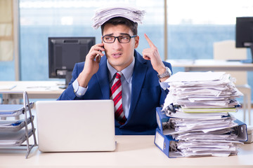 Businessman talking on the phone in the office