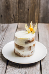 Carrot cake with spices on the rustic background. Selective focus.
