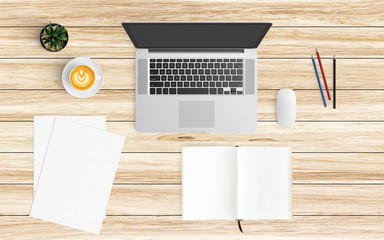 Modern workspace with coffee cup, paper, notebook, tablet or smartphone and laptop copy space on wood background. Top view. Flat lay style.