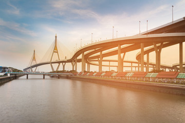 Double suspension bridge river front connect highway intersection