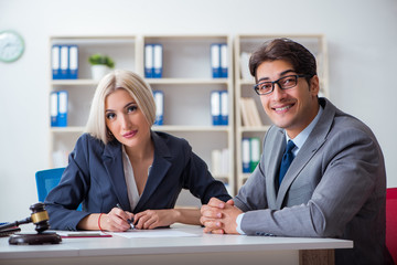 Lawyer discussing legal case with client