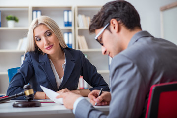 Lawyer discussing legal case with client