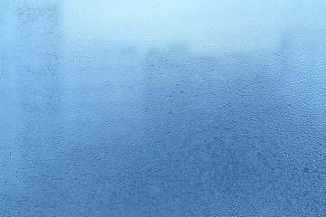 Natural water drops on glass