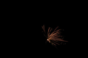 Naklejka premium The lights of the fireworks in the night sky.