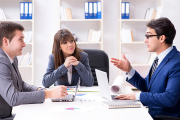 Business meeting with employees in the office
