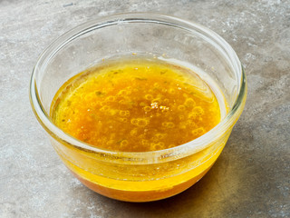 bowl of roast meat dripping