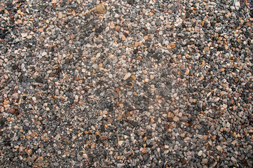 stone car park,a lot of rock and gravel background texture.