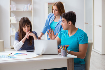 Obraz premium Team of designers discussing new interior project