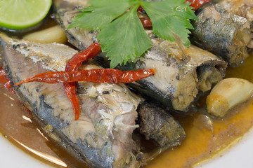Obraz na płótnie Canvas Mackerels in sweet and sour soup with spicy Thai food in white dish
