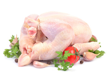 Fresh chicken with vegetables on a white background © valeriy555