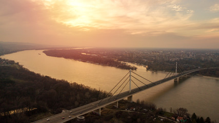 Beautiful drone shot of Novi Sad bridge at sunset