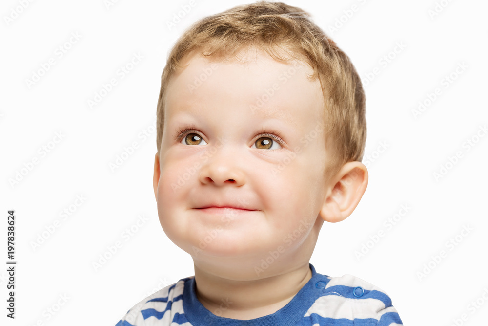 Wall mural cute little boy smiling, close-up, isolated