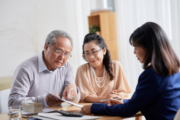 Fototapeta premium Discussing Terms of Purchase Agreement