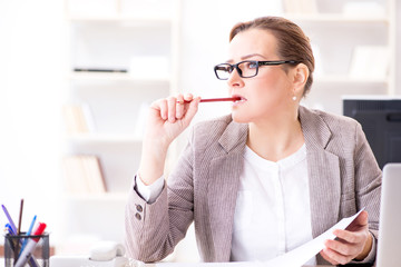 Businesswoman employee working in the office