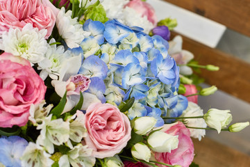 Beautiful spring flowers in soft pink and light blue colours.
