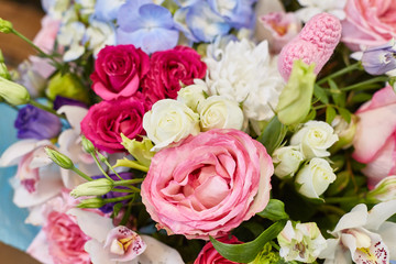 Beautiful spring flowers in soft pink and light blue colours.