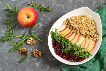 Vitamin vegetarian salad with quinoa, fruits and nuts
