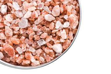 Fototapeta na wymiar Himalayan salt cristals seeds in pot isolated on white