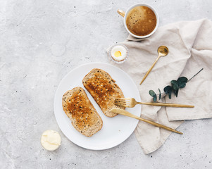 Crunchy toast with butter. Flat lay, top view