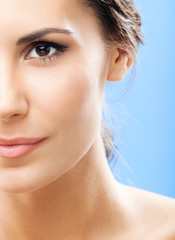 Fototapeta premium Portrait of beautiful woman, on blue