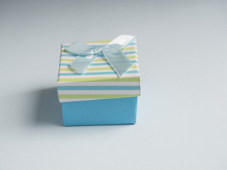 Gift box on blue