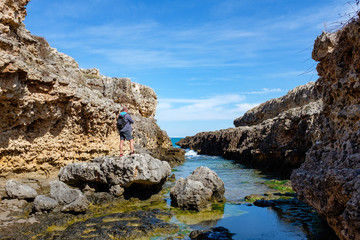 Fototapeta na wymiar Inlet along the rocky coastline of Polignano. Apulia, Italy