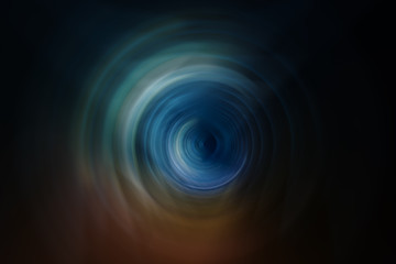 abstract blue spiral on dark background