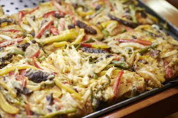 pizza with ham and cheese