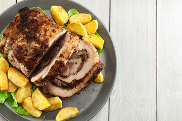 Roasted pork roll stuffed with other meat