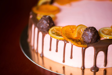 Cake with dried fruits, orange, lemon and chocolates