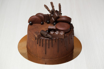 Chocolate cake with chocolate decoration, chocolate ganache