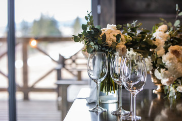 the bride's bouquet lies on a buffet table