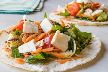 Homemade Vegetarian Tostadas with Salad, Cheese and Grated Carrot Slices