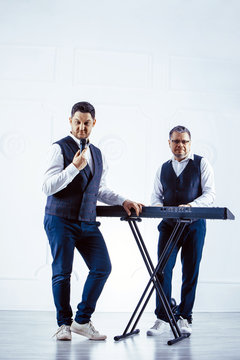 Music band performing in a studio