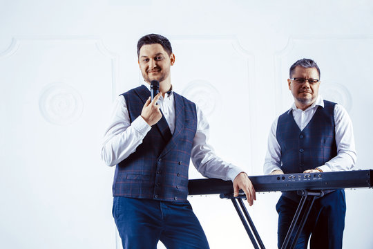 Music band performing in a studio