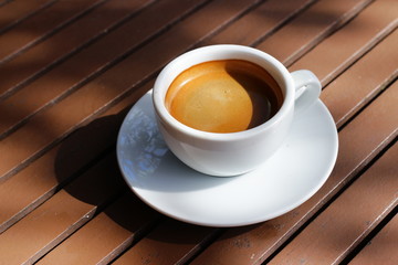 Espresso coffee cup dink on wood table 