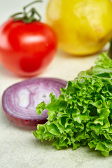 Fresh vegetables still life. Veges lined up on a white background, top view, close-up, selective focus, copy space.
