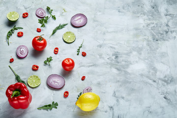 Chopped onion, red hot pepper and spice isolated on white background, top view, close-up, selective focus