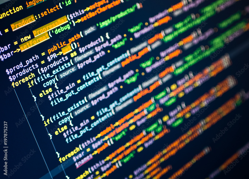 Aufkleber lines of php code on the monitor. dark blue background. close-up