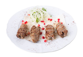 Delicious lamb kebab on pita.