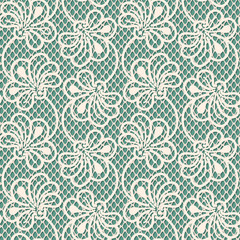 Seamless flower lace pattern on blue background