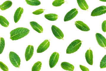 Fresh mint leaves pattern isolated on white background, flat lay. Macro.