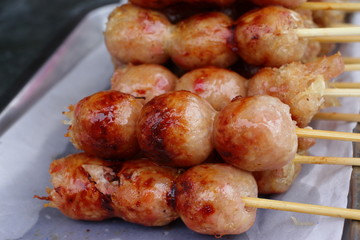 Deep fried sausages of fermented pork and glutinous rice northeastern Sai Krok Isaan Thai food