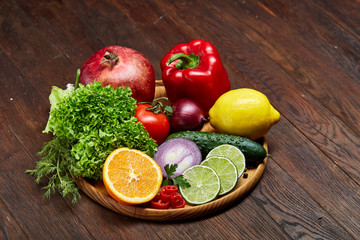 Bowl with oatmeal flakes served with fruits on wooden tray wooden background, flat lay, selective focus